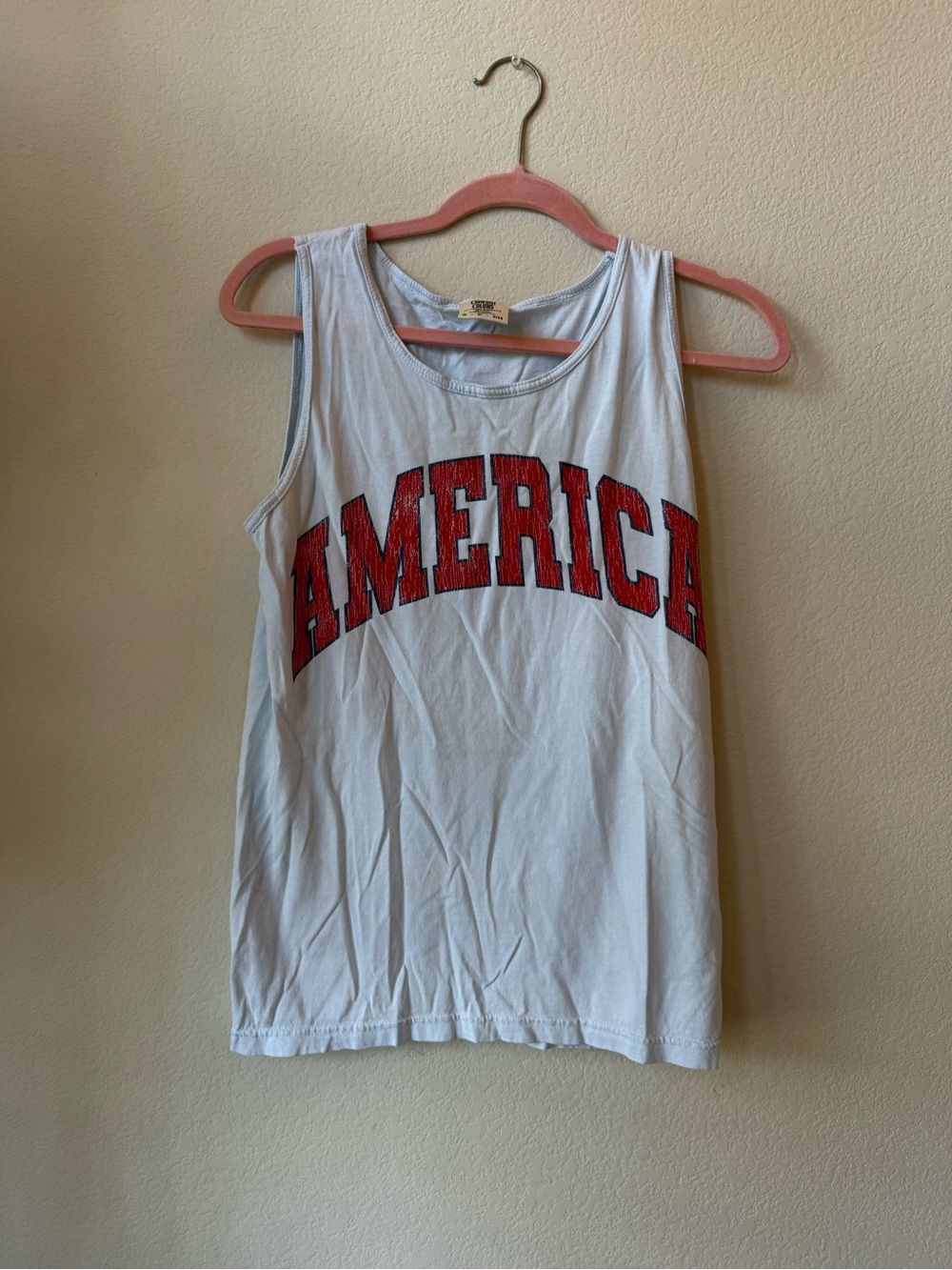 Light Blue Tank Top with Red "AMERICA" Graphic